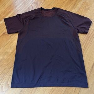 Lululemon Swiftly Tech Shirt size L black/reddish orange short sleeve